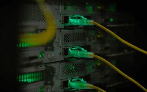 Yellow wires attached to graphics processing units within the Kempner's AI cluster.